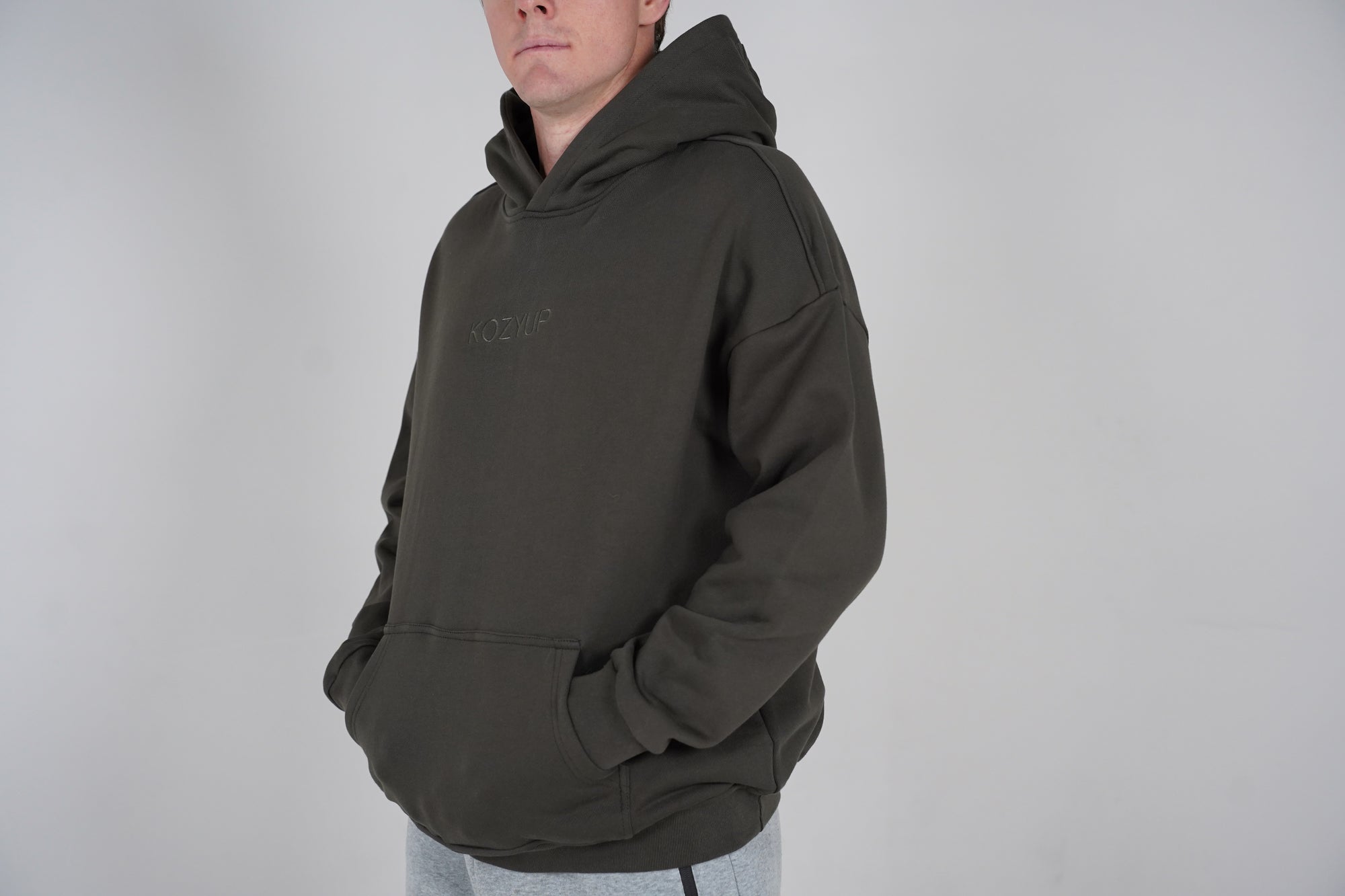Dark DreamKnit hoodie showing the hood, cotton fabric and KozyUp embroidery